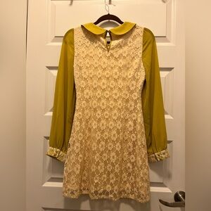 14” across bust, 13” across waist, 32” length from collar to hem.